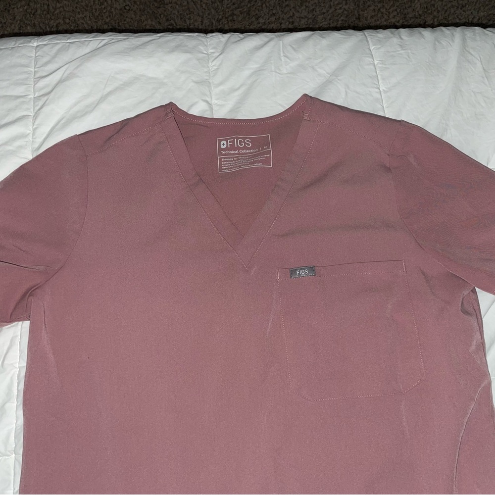 I believe mauve is the color- figs one pocket